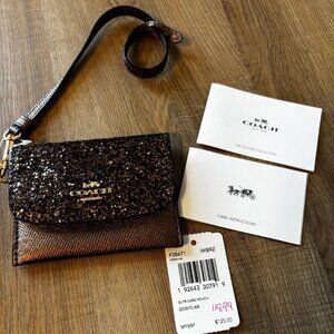 Coach Glitter Card Holder Wristlet with Care Card and tag MSRP $125